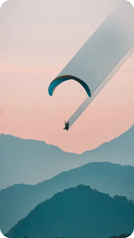 paesaggio con dettaglio di un paracadutista
